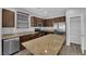Bright kitchen with wood cabinets, stainless steel appliances and granite countertops at 108 Fiery Hill Ave, Henderson, NV 89011