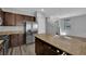 Kitchen with a large island, stainless steel appliances, and granite countertops at 108 Fiery Hill Ave, Henderson, NV 89011