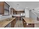 Kitchen with stainless steel appliances, granite countertops and wood cabinets at 108 Fiery Hill Ave, Henderson, NV 89011