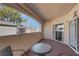 Inviting balcony with a bistro table, offering pleasant views of the neighborhood at 108 Lemon Glaze St # 202, Las Vegas, NV 89145