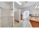 Community bathroom featuring vanities, sinks, mirrors, toilet stalls, and a standing shower at 108 Lemon Glaze St # 202, Las Vegas, NV 89145