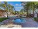 Community pool and lounge area featuring palm trees, a jacuzzi hot tub and resort style ammenities at 108 Lemon Glaze St # 202, Las Vegas, NV 89145