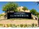 Downtown Summerlin entrance sign, surrounded by lush landscaping, provides an inviting welcome at 11099 Moonlight Fire Ct, Las Vegas, NV 89135