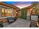 Charming front porch with comfortable seating, creating a welcoming entrance to the home at 11099 Moonlight Fire Ct, Las Vegas, NV 89135