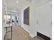Inviting hallway features hardwood floors, stylish decor, and seamless flow throughout the home at 11099 Moonlight Fire Ct, Las Vegas, NV 89135