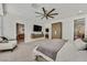 A spacious main bedroom with an ensuite bathroom and modern decor at 11099 Moonlight Fire Ct, Las Vegas, NV 89135