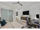 This home office area is bright and spacious with a full-sized desk and comfortable sofa at 11099 Moonlight Fire Ct, Las Vegas, NV 89135