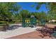 Community playground with climbing structure, slides and benches, provides a safe and fun environment for  at 11099 Moonlight Fire Ct, Las Vegas, NV 89135