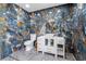 Lavish bathroom with blue marble walls, a unique vanity, and eye-catching fixtures at 1300 Oak Tree Ln, Las Vegas, NV 89108
