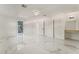 Spacious bedroom with white walls and marble floors, large closet, and ensuite bathroom with custom shower at 1300 Oak Tree Ln, Las Vegas, NV 89108