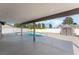 Covered patio with pool view including an outdoor storage shed at 1300 Oak Tree Ln, Las Vegas, NV 89108