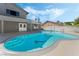 Backyard pool with unique underwater turtle design and pristine landscaping at 1300 Oak Tree Ln, Las Vegas, NV 89108