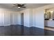 A very large bedroom has many doors, with the en-suite bath on the right at 1416 Swanbrooke Dr, Las Vegas, NV 89144