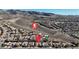 Scenic aerial view of a residential area near hiking trails, set against a mountain backdrop at 2325 Janesville Ln, Henderson, NV 89044