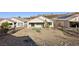 Backyard view showcasing the outdoor living space with low-maintenance desert landscaping at 2511 Jada Dr, Henderson, NV 89044