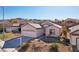 Beautiful home exterior featuring a well-manicured lawn and desert landscaping at 2511 Jada Dr, Henderson, NV 89044