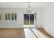 Bright living room with hardwood floors, recessed lighting, and sliding glass doors at 2511 Jada Dr, Henderson, NV 89044