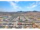 Expansive aerial view of the community with mountains in the distance at 3004 Barrett Springs Ave, Henderson, NV 89044