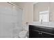 Bathroom featuring a glass-enclosed shower, toilet, and a vanity with dual sinks and modern fixtures at 3004 Barrett Springs Ave, Henderson, NV 89044