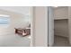 This bedroom features carpeted floors, large windows with a view, and a walk in closet at 3004 Barrett Springs Ave, Henderson, NV 89044