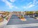 Gated community entrance featuring well-maintained landscaping enhancing the neighborhood's aesthetic appeal at 3004 Barrett Springs Ave, Henderson, NV 89044