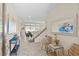 Bright entryway showcasing neutral tile floors, staircase, and decor that create an inviting and welcoming ambiance at 3004 Barrett Springs Ave, Henderson, NV 89044