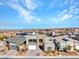 A high angle of the home displaying the surrounding neighborhood and mountain views at 3004 Barrett Springs Ave, Henderson, NV 89044