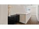 Bright hallway featuring hardwood floors and a nice cabinet at 3004 Barrett Springs Ave, Henderson, NV 89044