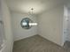 Dining room features tile floors, a modern light fixture and a round mirror at 3669 Canis Minor Ln # 15101, Henderson, NV 89052