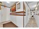 Inviting hallway with neutral walls, tiled floors, and decorative accents at 3920 Geist Ave, Las Vegas, NV 89115