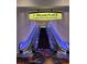 Welcoming escalators lead to Palms Place Laguna Pool House & Kitchen, highlighted by a bright, inviting sign at 4381 W Flamingo Rd # 903, Las Vegas, NV 89103