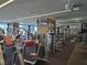 Well-equipped gym featuring modern exercise machines, ceiling fans, and televisions for an invigorating workout experience at 4381 W Flamingo Rd # 903, Las Vegas, NV 89103