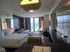 Luxurious room features stylish desk, sleek TV console, city views, and convenient workspace at 4381 W Flamingo Rd # 903, Las Vegas, NV 89103