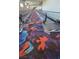 Moving walkway with colorful patterned carpet offers a convenient and stylish transit experience at 4381 W Flamingo Rd # 903, Las Vegas, NV 89103