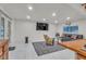 Spacious living room with ample light and a cozy seating area at 4587 Yellow Pine Ave, Mount Charleston, NV 89124