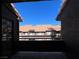 Balcony view to another building offering serene views, enhancing the appeal of the space at 5024 S Rainbow Blvd # 203, Las Vegas, NV 89118