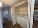 Convenient laundry area with washer and dryer hookups near the kitchen and other rooms of the home at 5024 S Rainbow Blvd # 203, Las Vegas, NV 89118