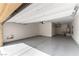 Spacious two-car garage with epoxy flooring and ample storage space at 5646 Sophie Belle Ave, Las Vegas, NV 89131