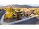 Street view of the homes exterior, featuring mountain views in the background at 5646 Sophie Belle Ave, Las Vegas, NV 89131