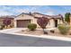 Charming single-story home with a well-manicured front yard and two car garage at 5928 Radiance Park St, North Las Vegas, NV 89081