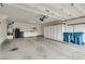 Spacious three car garage with built-in storage cabinets for tools and organization at 5928 Radiance Park St, North Las Vegas, NV 89081