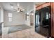 Bright kitchen with tile flooring, granite countertops and stainless steel appliances at 5928 Radiance Park St, North Las Vegas, NV 89081