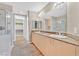Bathroom features double sinks and granite countertops at 62 E Serene Ave # 114, Las Vegas, NV 89123