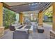 Inviting community patio with comfortable seating, fire pit and covered pergola at 62 E Serene Ave # 114, Las Vegas, NV 89123