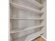 A closet pantry with multiple shelves to offer plenty of storage at 62 E Serene Ave # 114, Las Vegas, NV 89123