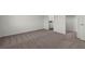 Neutral-toned bedroom featuring soft carpeting and a walk-in closet, offering ample space at 6264 Blood Lily Ave, Las Vegas, NV 89122