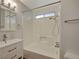 Bathroom featuring tub-shower, vanity and bright lighting at 6870 Laronda Ln, Las Vegas, NV 89156