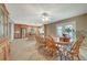 A large dining room and a peek into the kitchen at 6870 Laronda Ln, Las Vegas, NV 89156