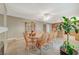 Spacious dining room with a large wooden table and seating for eight at 6870 Laronda Ln, Las Vegas, NV 89156