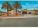 Charming single-story home featuring desert landscaping, a two-car garage, and gated courtyard at 6870 Laronda Ln, Las Vegas, NV 89156